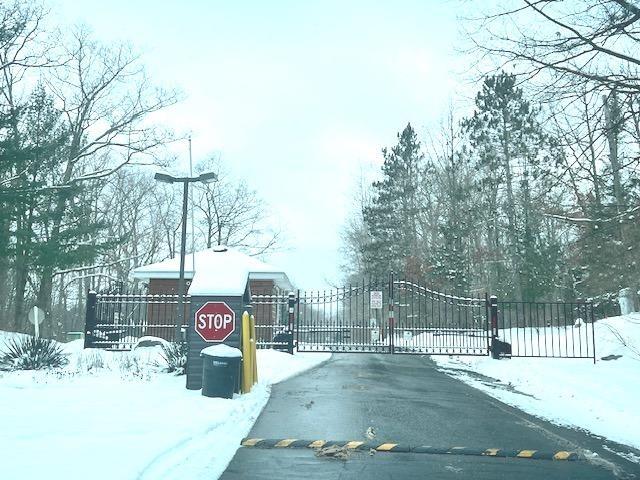 view of snow covered gate