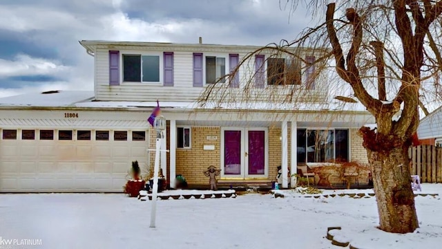 view of front of property featuring a garage