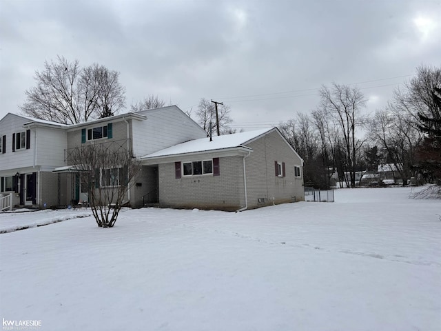 view of snow covered property