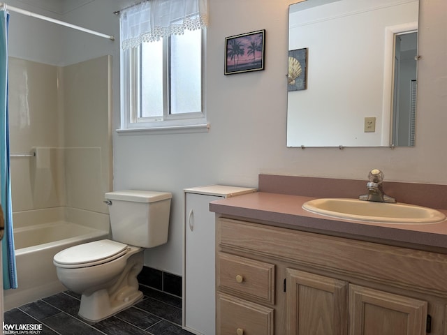 full bathroom featuring toilet, tile patterned flooring, shower / tub combo, and vanity