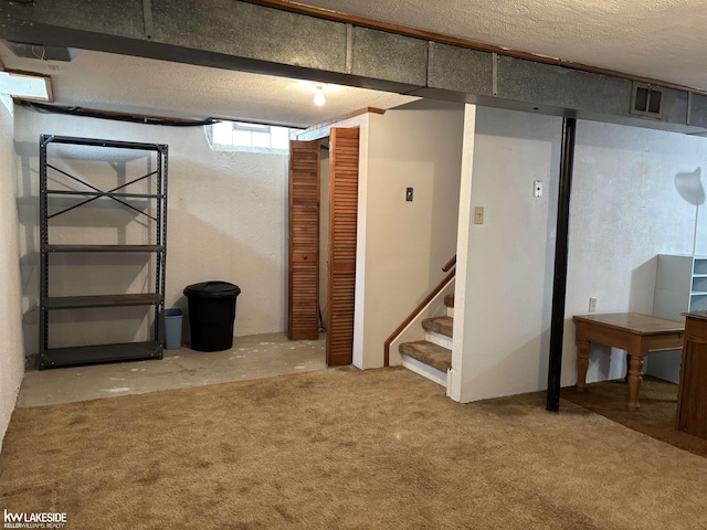 basement with carpet flooring