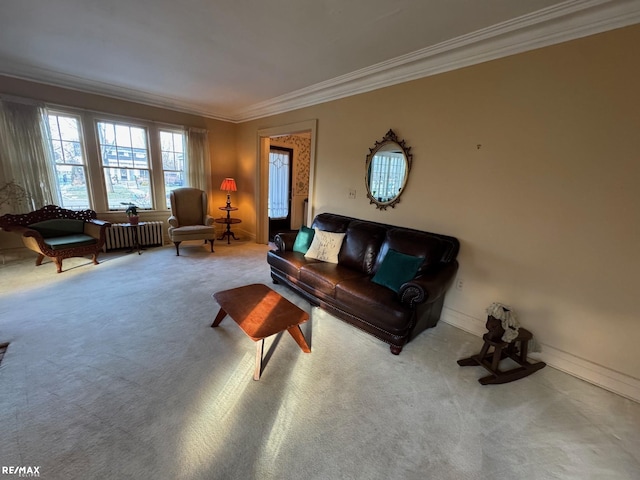 carpeted living room featuring ornamental molding