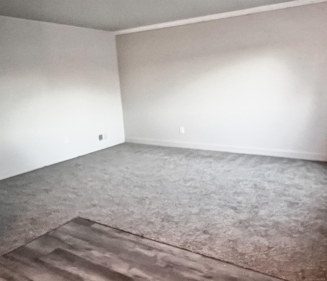 empty room featuring hardwood / wood-style floors