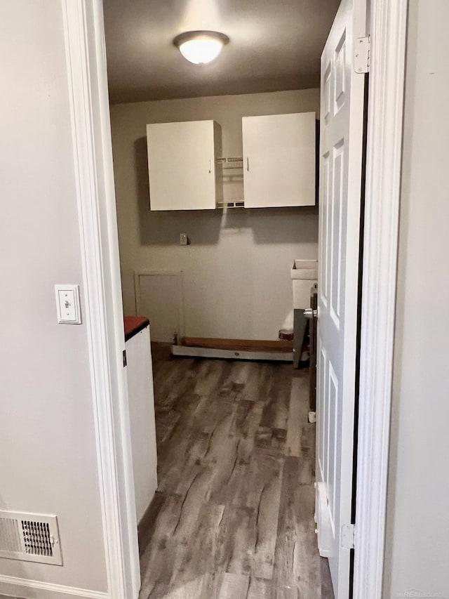 washroom with hardwood / wood-style flooring