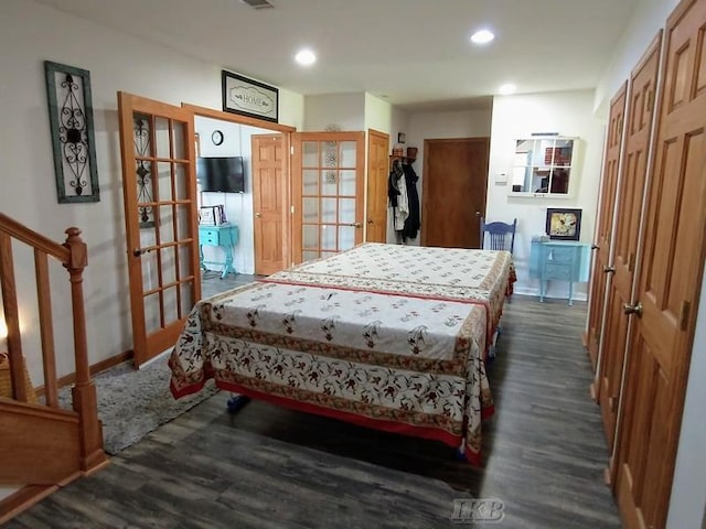 bedroom featuring dark hardwood / wood-style floors