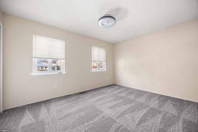 view of carpeted spare room