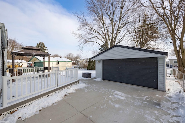 view of snow covered garage