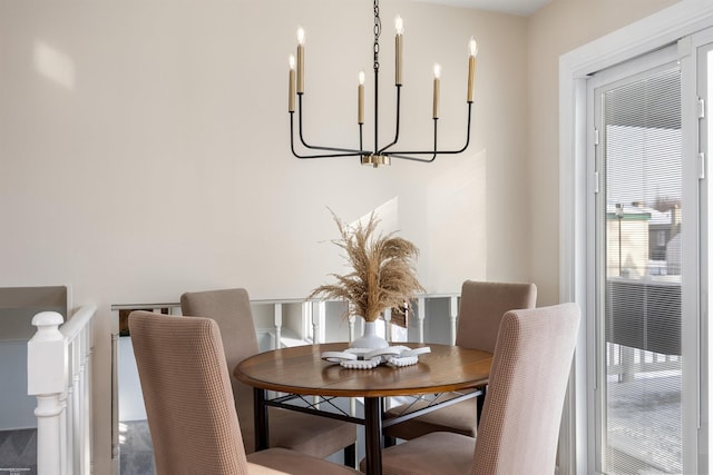 dining area featuring a chandelier