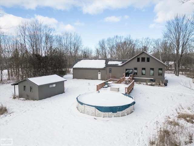 view of snow covered house