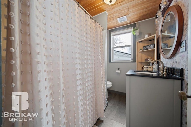 bathroom with wood ceiling, toilet, vanity, and wood-type flooring