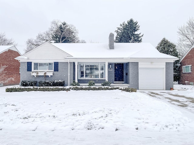 single story home featuring a garage