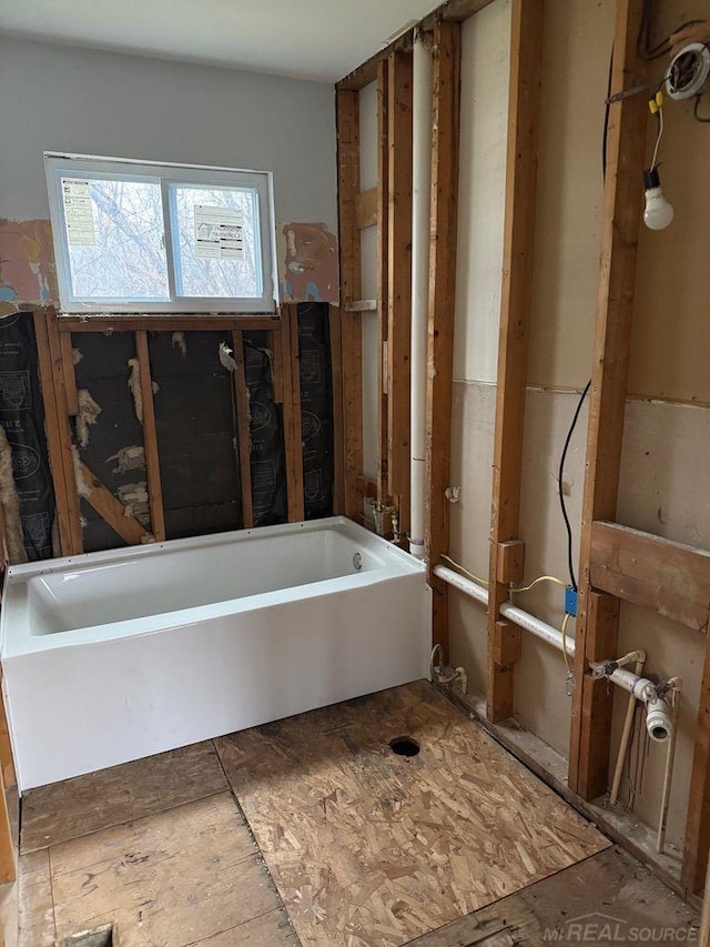 bathroom with a bathing tub