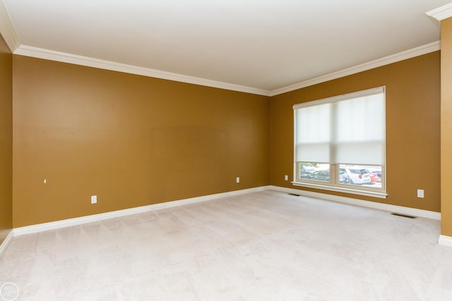 carpeted empty room with ornamental molding