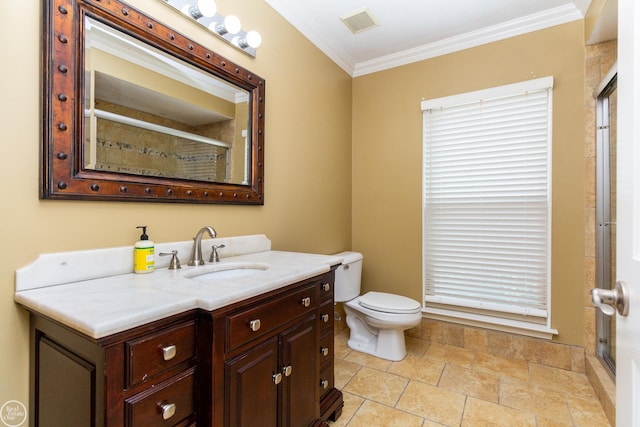 bathroom featuring toilet, vanity, ornamental molding, and walk in shower