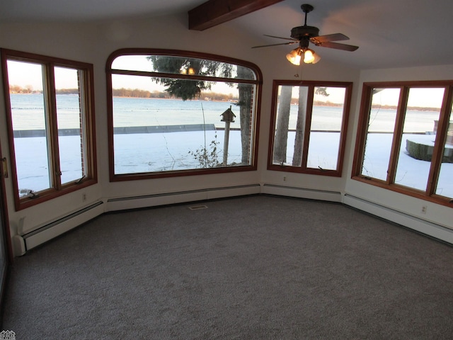 unfurnished sunroom with ceiling fan, plenty of natural light, beamed ceiling, and a water view