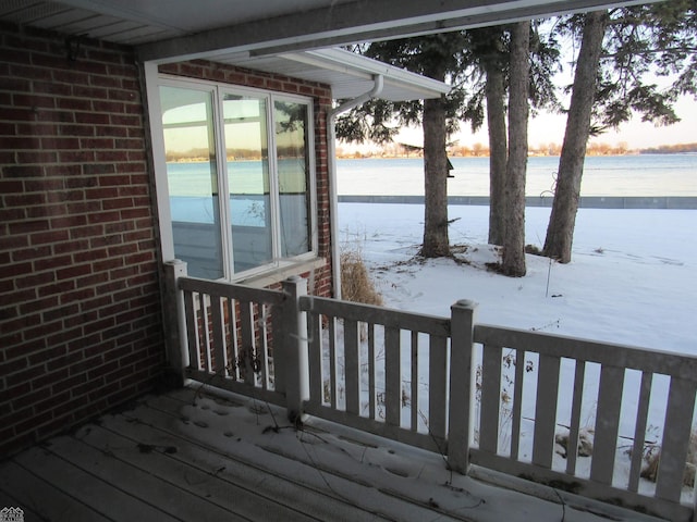 deck at dusk with a water view