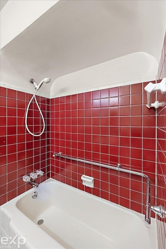 bathroom with shower / bathing tub combination