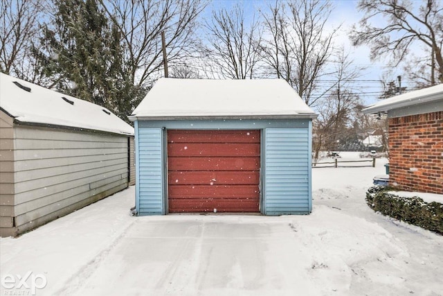 view of snow covered garage