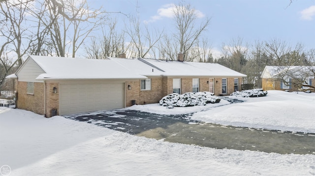 ranch-style home with a garage