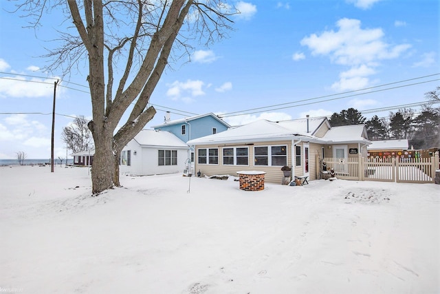 view of snow covered house