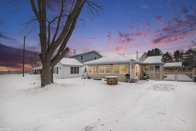 view of snow covered house