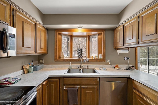 kitchen featuring appliances with stainless steel finishes and sink