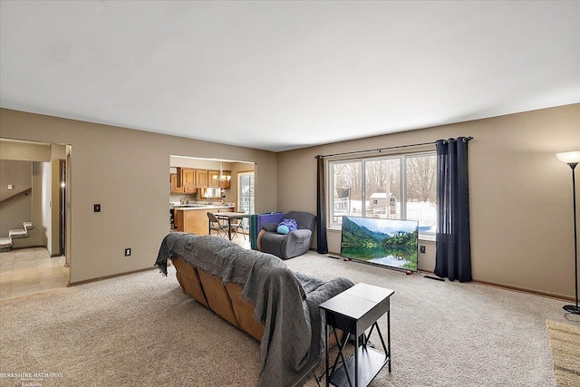 living room with light colored carpet and a wealth of natural light