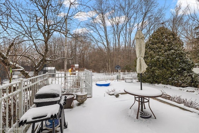 view of snow covered patio