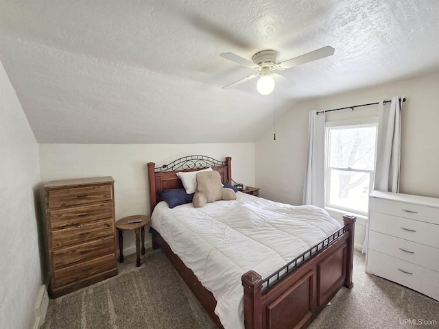 bedroom with ceiling fan, a textured ceiling, carpet floors, and lofted ceiling