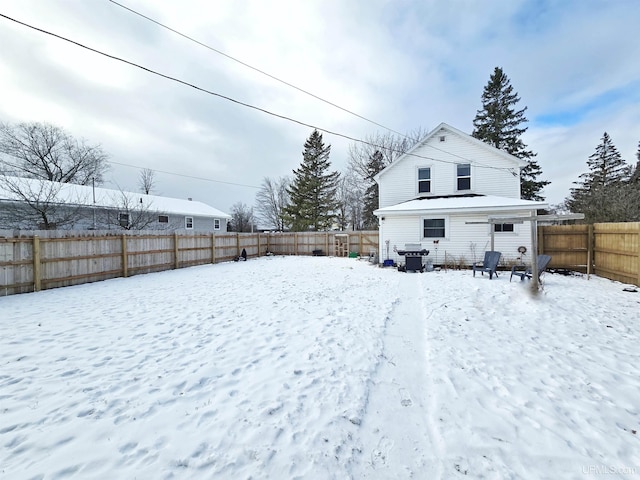 view of snowy yard