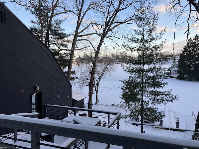 view of snow covered deck