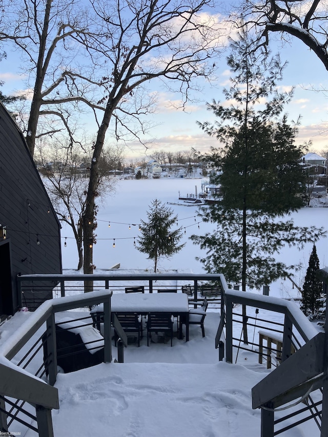 view of snow covered deck