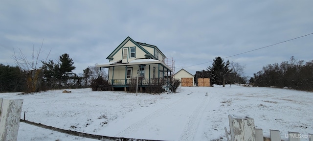 view of front of property featuring covered porch