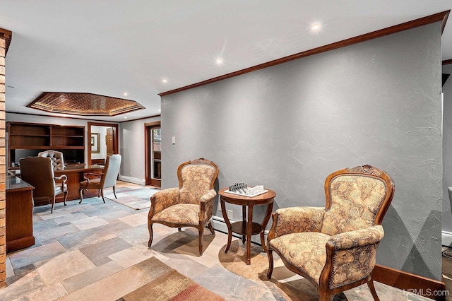 living area featuring baseboard heating and crown molding