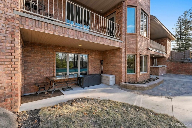 exterior space featuring a balcony