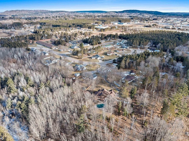 birds eye view of property with a mountain view