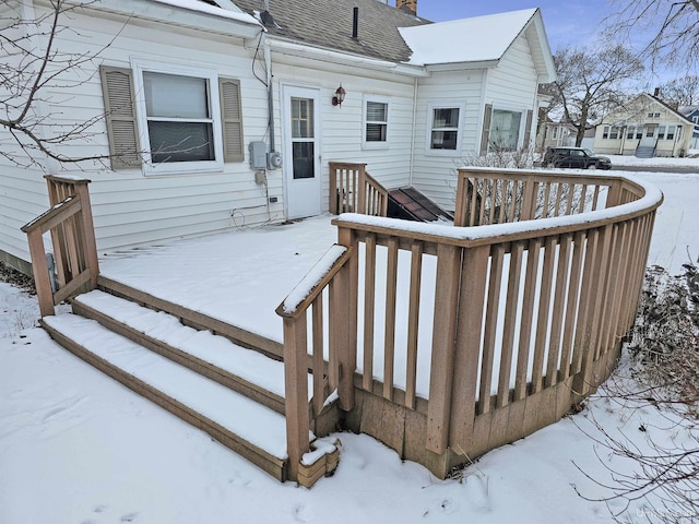 view of snow covered deck