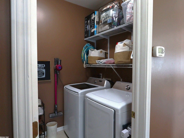 laundry area with washer and clothes dryer