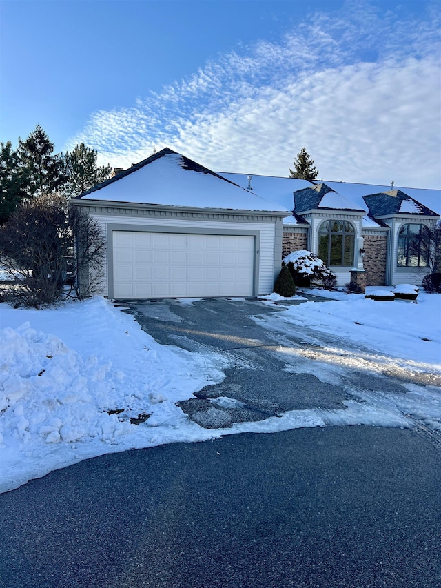 ranch-style house with a garage