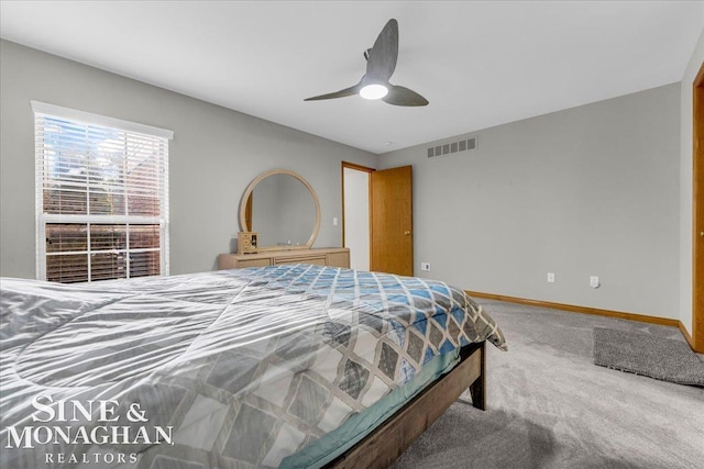 carpeted bedroom featuring ceiling fan