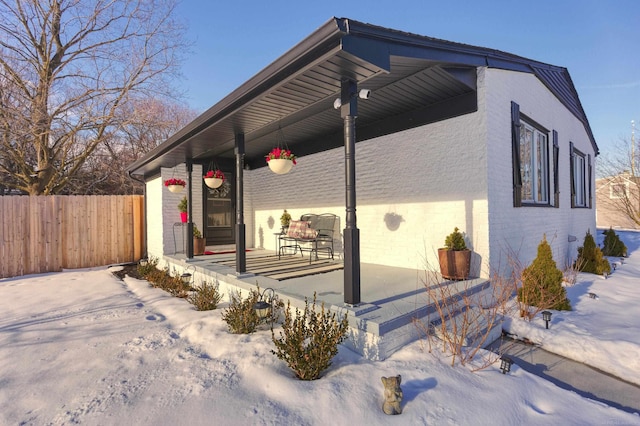 view of snow covered property