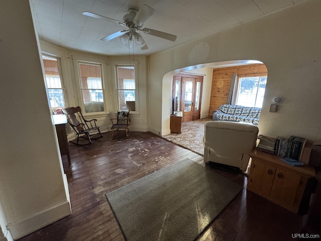 sitting room featuring ceiling fan and dark hardwood / wood-style flooring