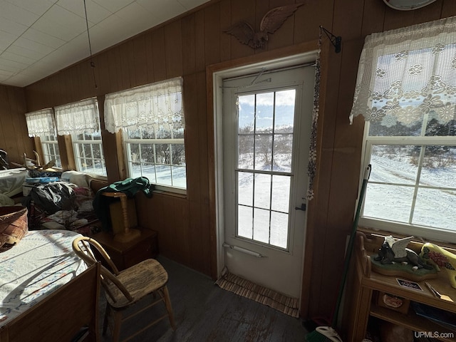 doorway with wooden walls