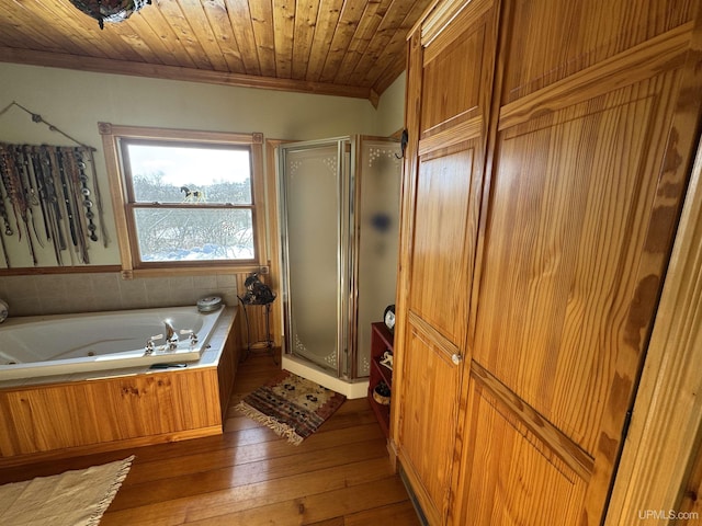 bathroom featuring independent shower and bath, wood ceiling, crown molding, and hardwood / wood-style floors