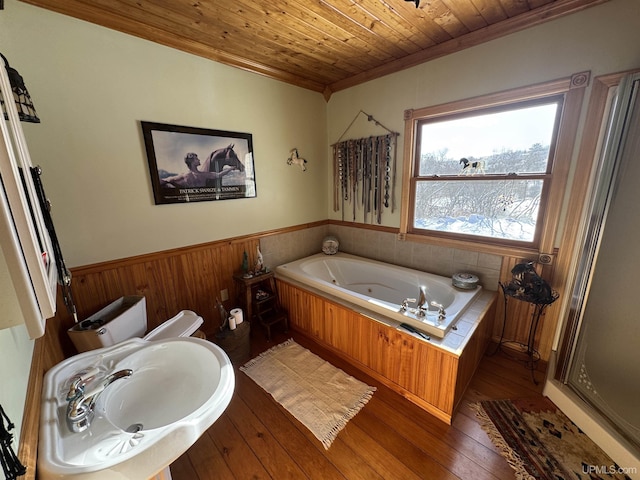 bathroom featuring hardwood / wood-style floors, sink, wood ceiling, ornamental molding, and shower with separate bathtub