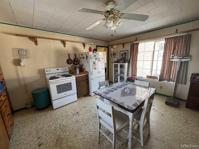 kitchen with ceiling fan and white appliances