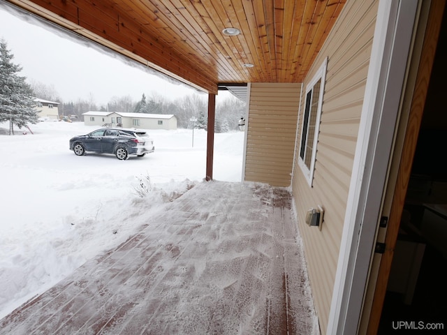 view of snow covered patio