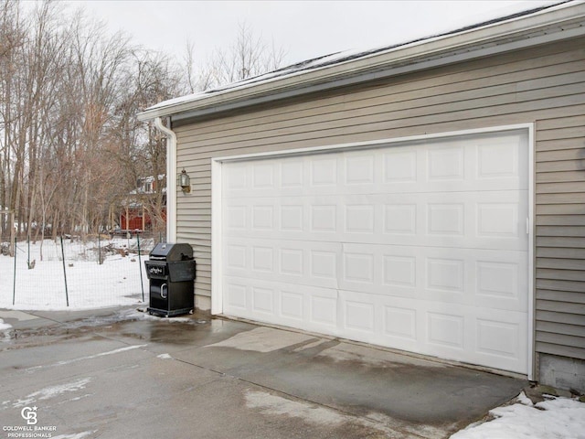 view of snow covered garage