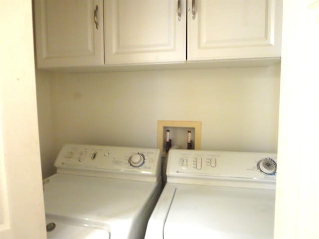 laundry area featuring independent washer and dryer