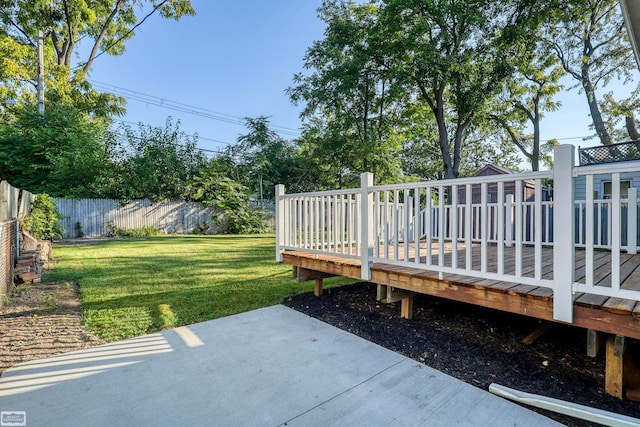 view of yard featuring a wooden deck